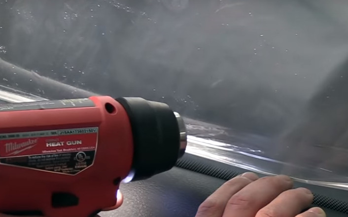 how to remove old tint window: apply heat gun