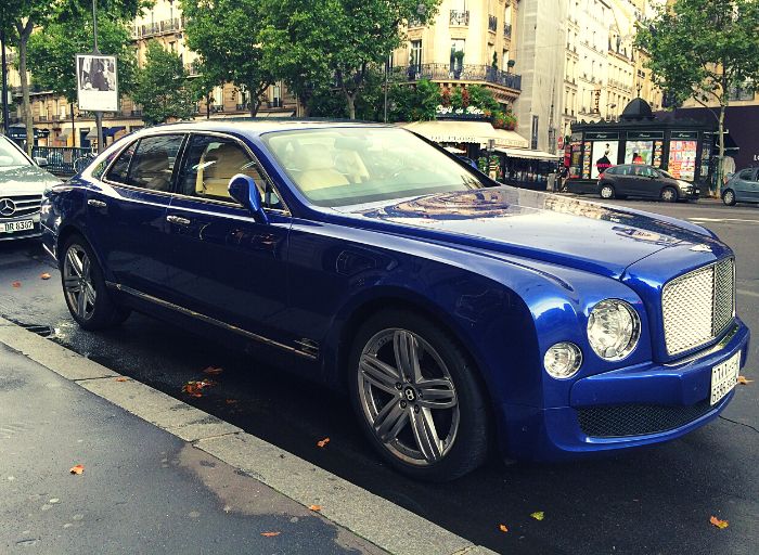Bentley parking on a street