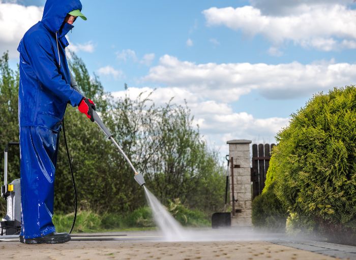 wear protective clothes while using pressure washer